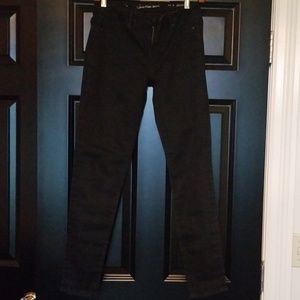 Barely worn Calvin Klein jeans in black stretch.